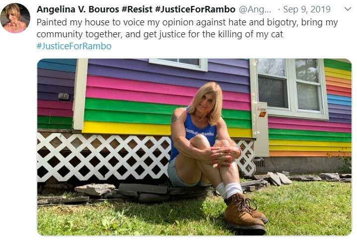 Angelina Bouros in front of her rainbow house in a tweet