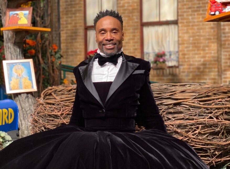 Billy Porter in his tux dress at Big Bird's place.