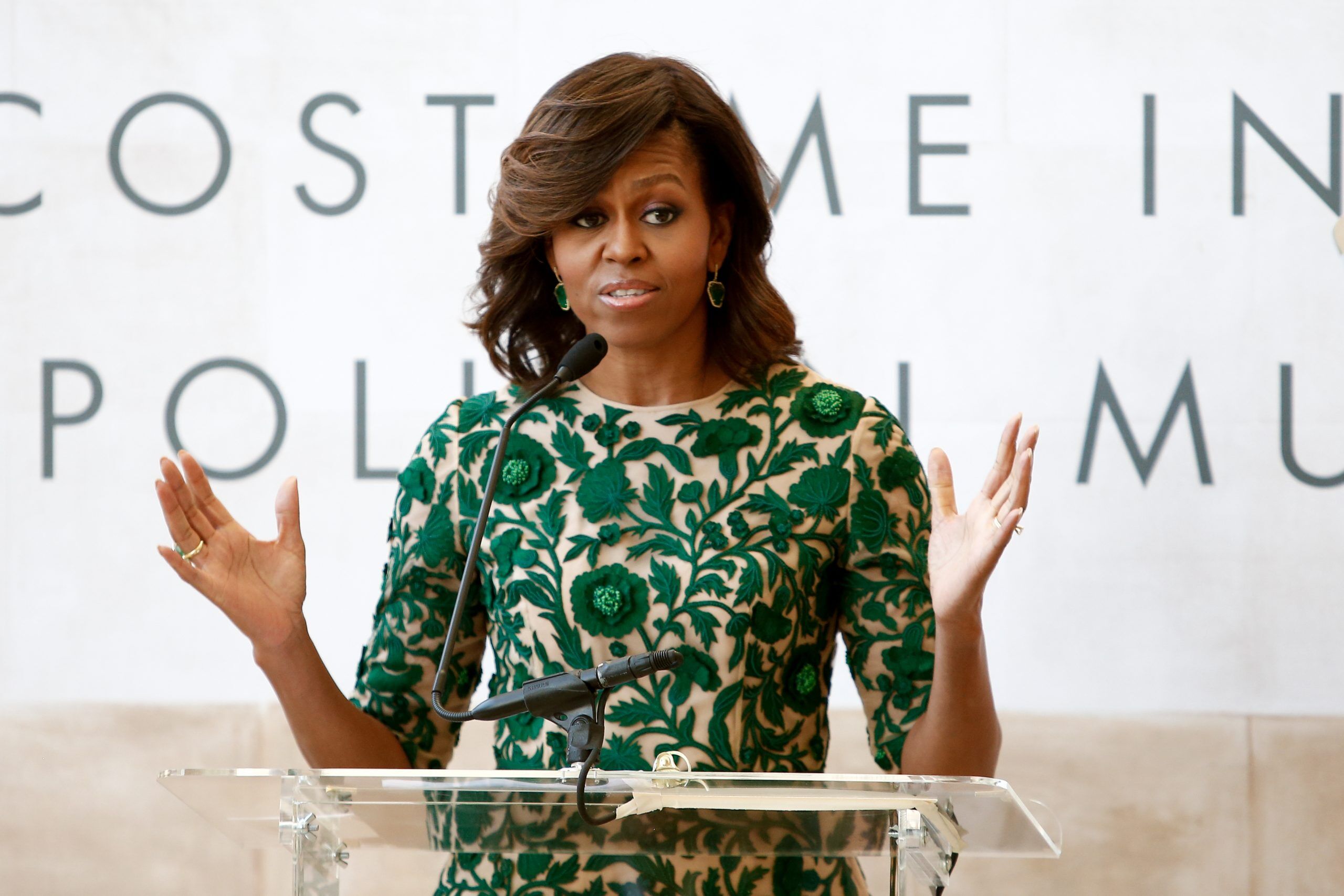 First Lady of the United States Michelle Obama at ribbon cutting ceremony for Anna Wintour Costume Center Grand Opening at Metropolitan Museum of Art on May 5, 2014 in New York City.