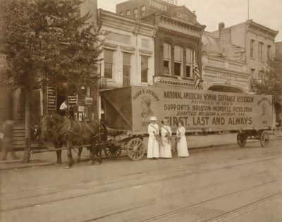 In 1914 a horse drawn float declares National American Woman Suffrage Association's support for Bristow-Mondell Resolution drafted by Susan B. Anthony in 1874.