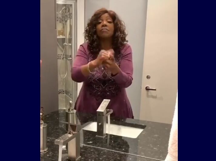 Gloria Gaynor washing her hands