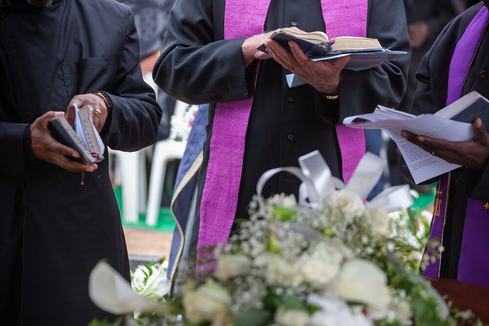 Ministers at a funeral