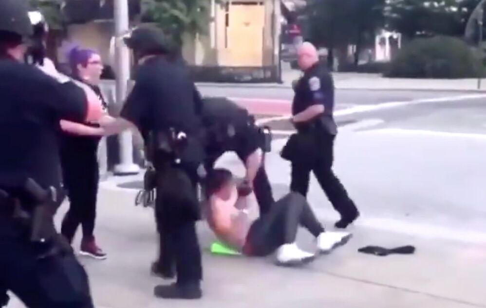 Indianapolis police officers surrounded and beat two unarmed women in video captured by a bystander