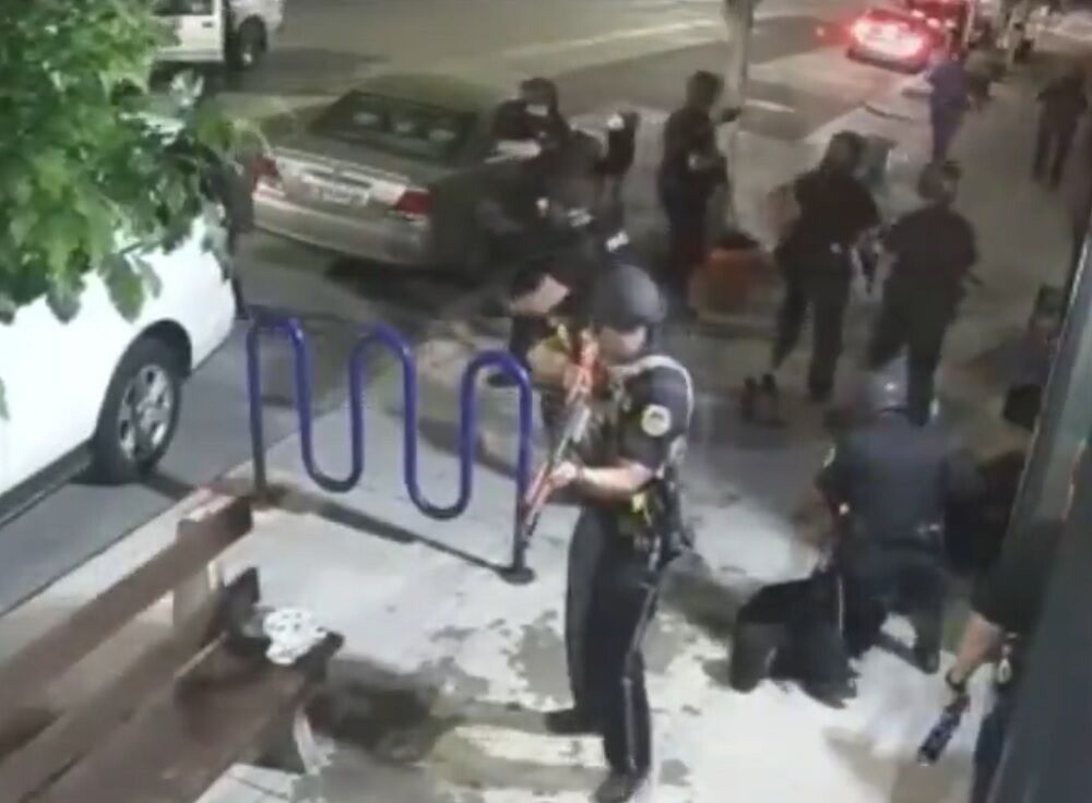 Police arrive at the bar with guns