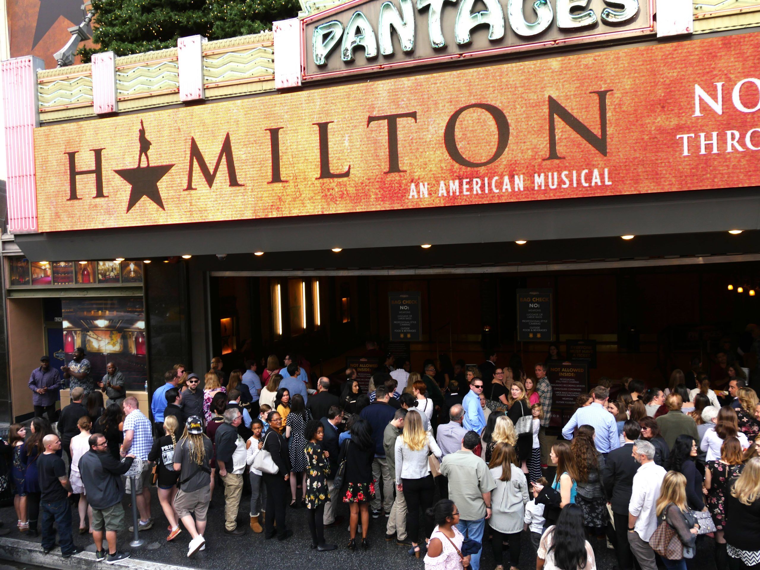 JANUARY 2018: Crowds of people wait outside the Pantages Theatre in Hollywood, CA for the musical "Hamilton"