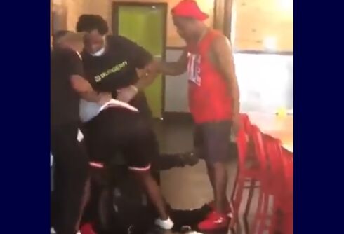 Fast food worker fired after mob beat him & called him a “fa***t” in shocking video