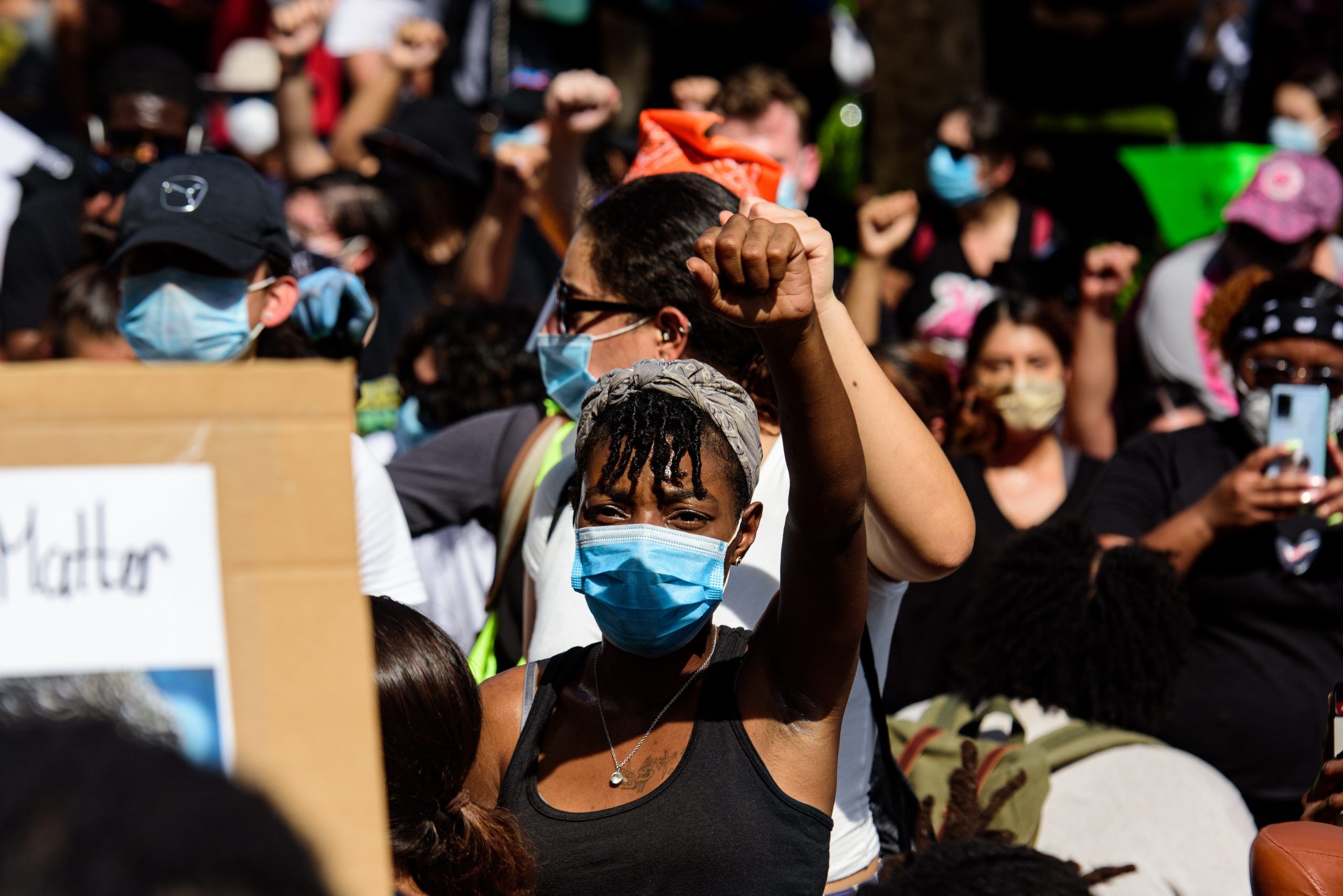 Miami Downtown, FL, USA - MAY 31, 2020: Woman leading a group of BLM demonstrators