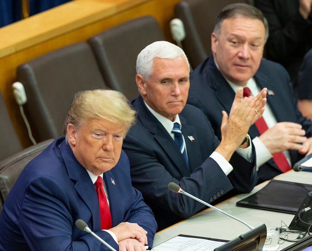 September 23, 2019: Donald Trump speaks as Mike Pence and Mike Pompeo listen during UN global call to protect religious freedom meeting at UN Headquarters