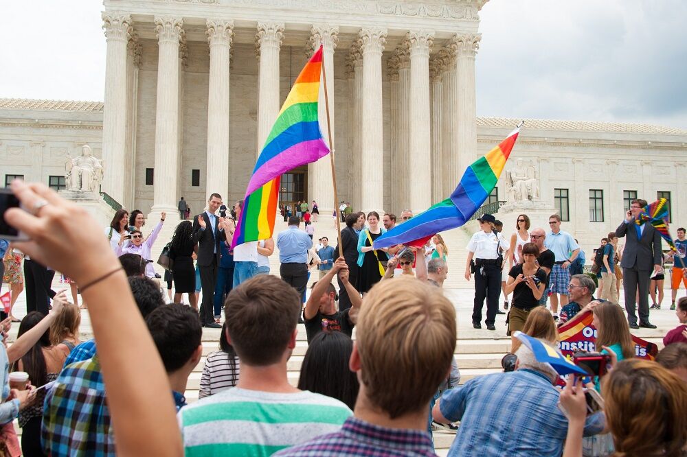 A crowd gathers at the U.S. Supreme opinion after its ruling legalizing same-sex marriage in all fifty states was delivered on June 26, 2015
