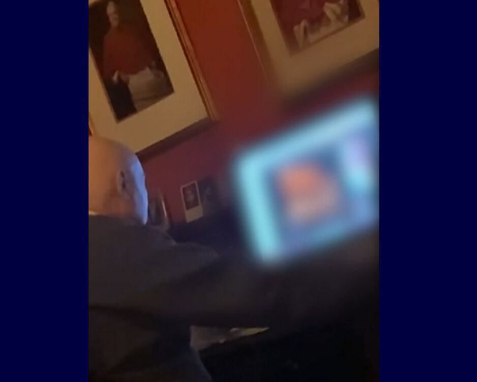 Video allegedly shows Father George Rutler looking at a gay porn video at the church in New York City.