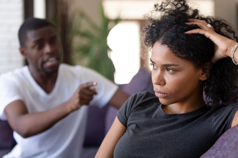 A man and woman arguing