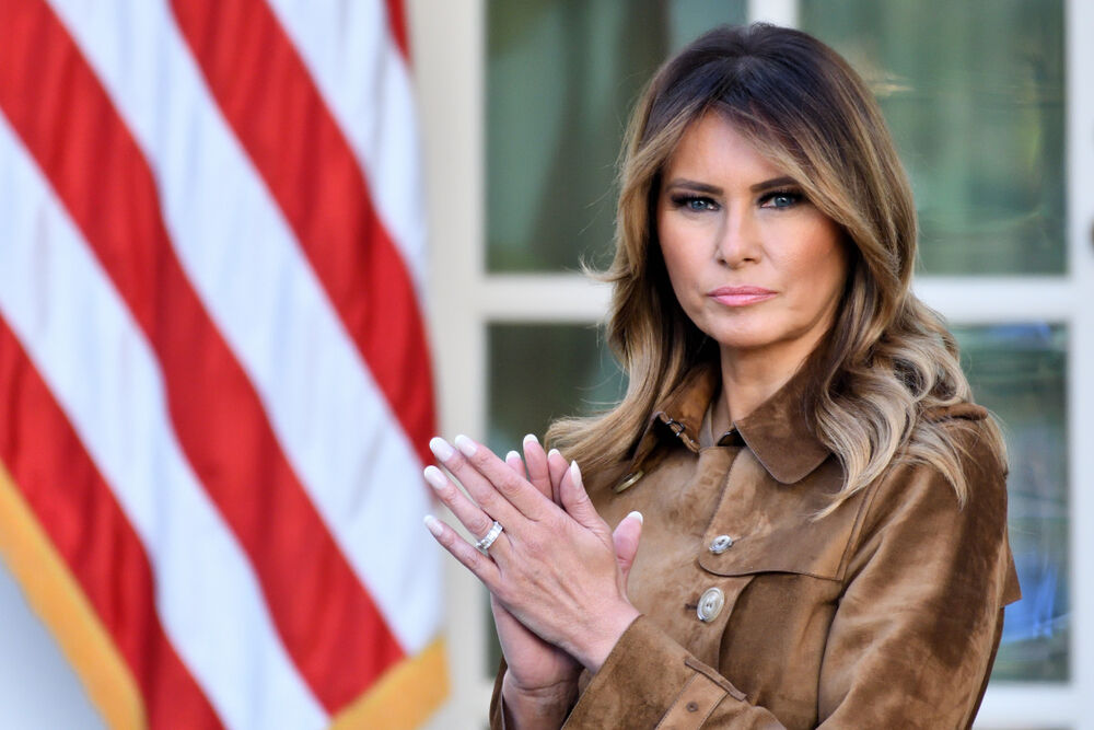 WASHINGTON, DC - NOVEMBER 26, 2019: First Lady Melania Trump stands in the Rose Garden of the White House as the President pardons the Thanksgiving Turkey, "Butter".