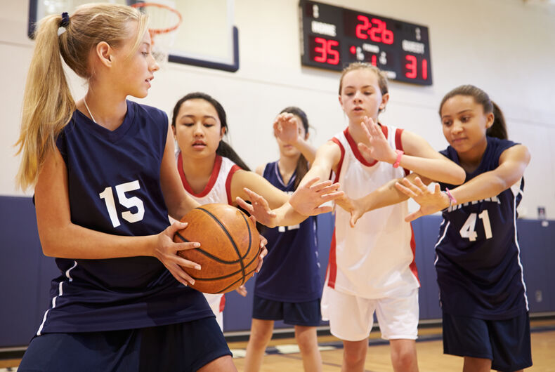 school-sports girls playing basketball