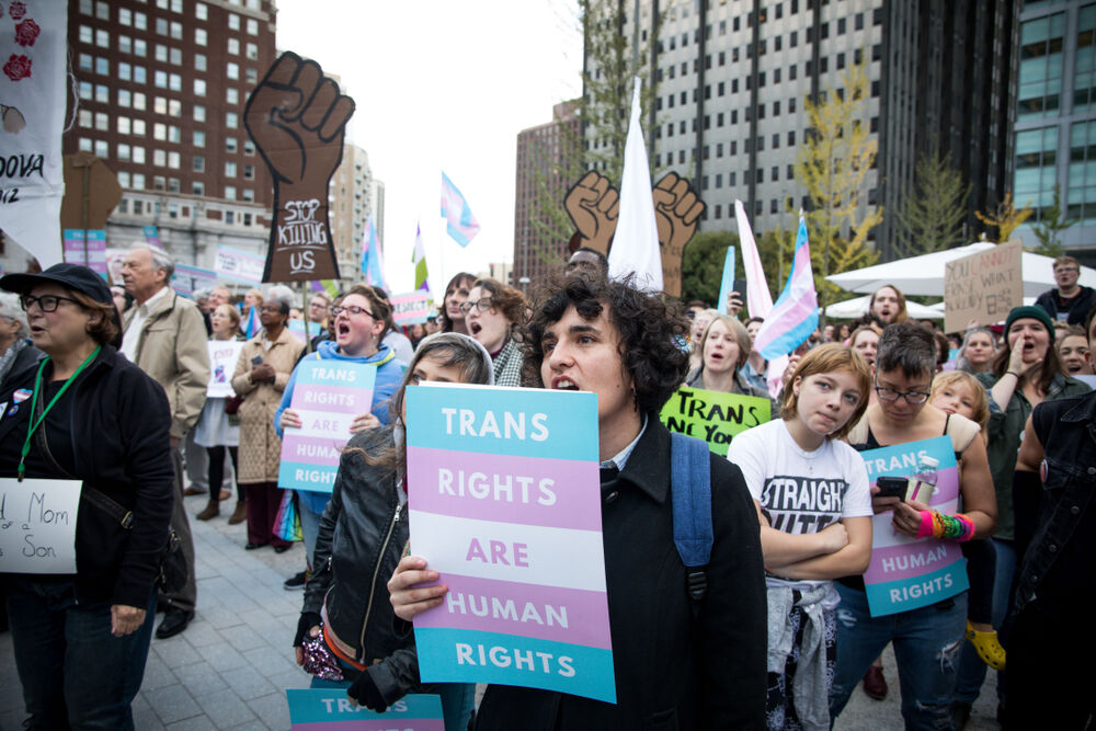 Protestors demonstrate against the Trump administration's attempt to write transgender identity out of the law in 2018 in Philadelphia.