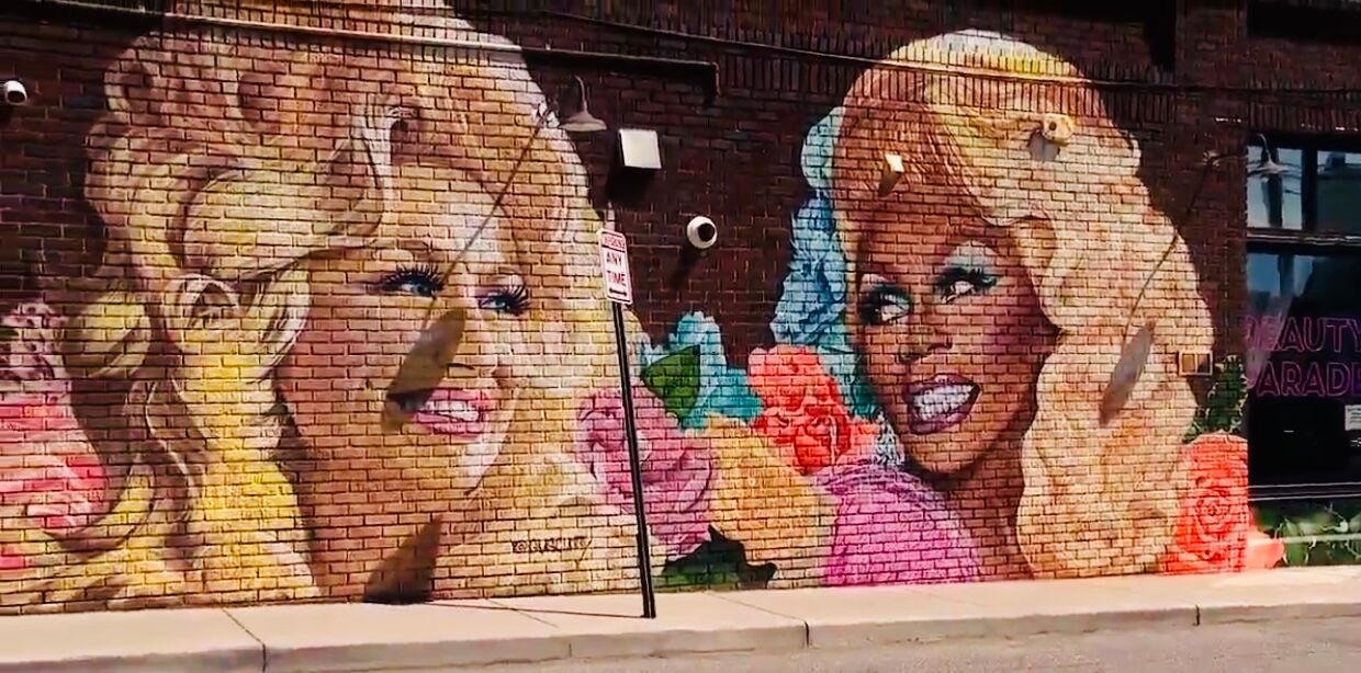 Dolly Parton and RuPaul in mural form on the Beauty Parade Salon in West Asheville, North Carolina