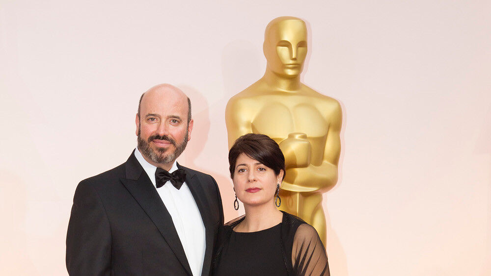 Scott Rudin (left) and a guest at the 2015 Oscars ceremony