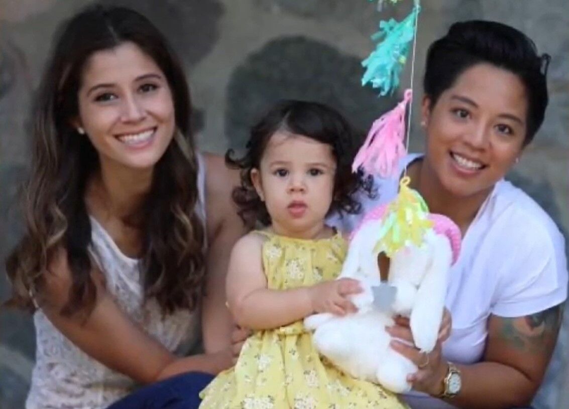 Tatiana Arena-Villareal and her wife and child.