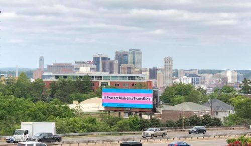 A billboard sporting the trans flag now greets GOP legislators in Birmingham.
