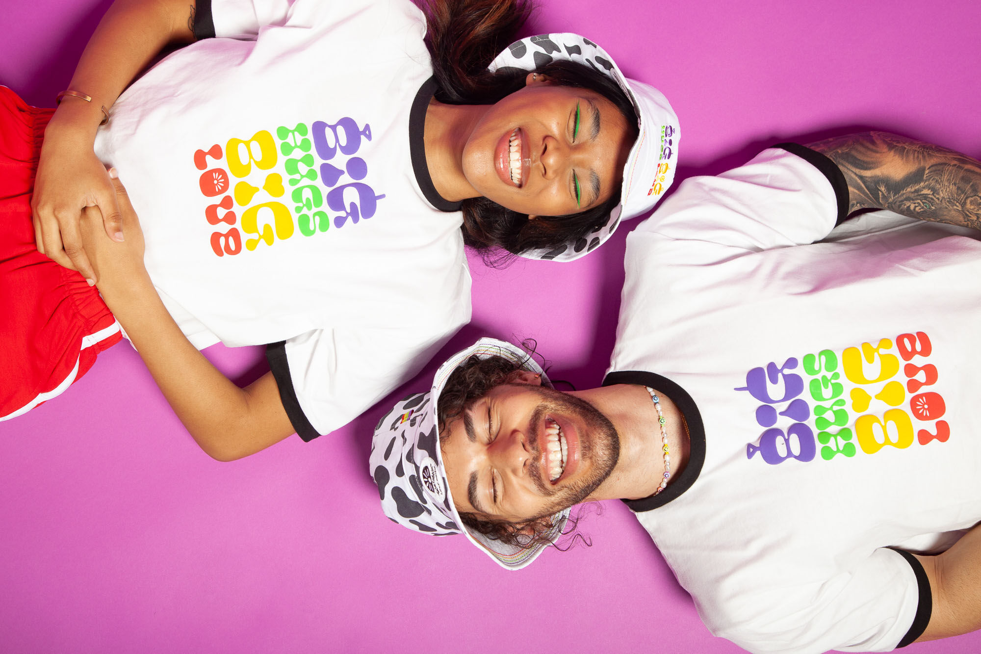 Two models wearing the Teletubbies Pride collection merchandise.