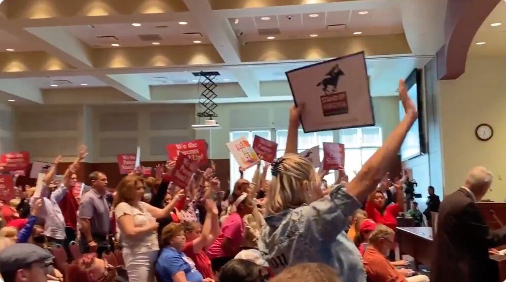 Religious right activists turned out to storm a school board meeting to protest calling students by their name and demand pupils not be taught something that isn't offered in the district.