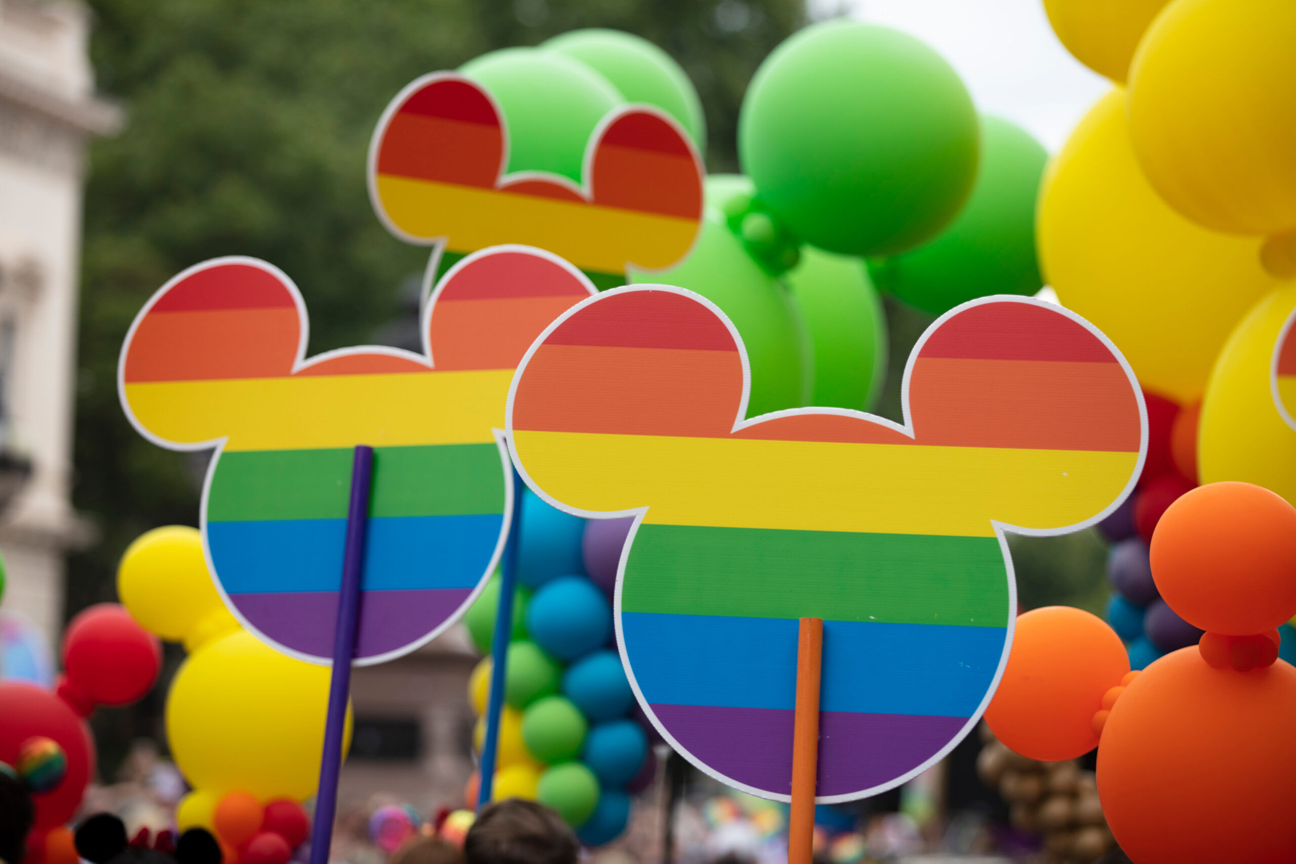 Mickey Mouse icon with gay rainbow flag design at the annual gay pride march in central London