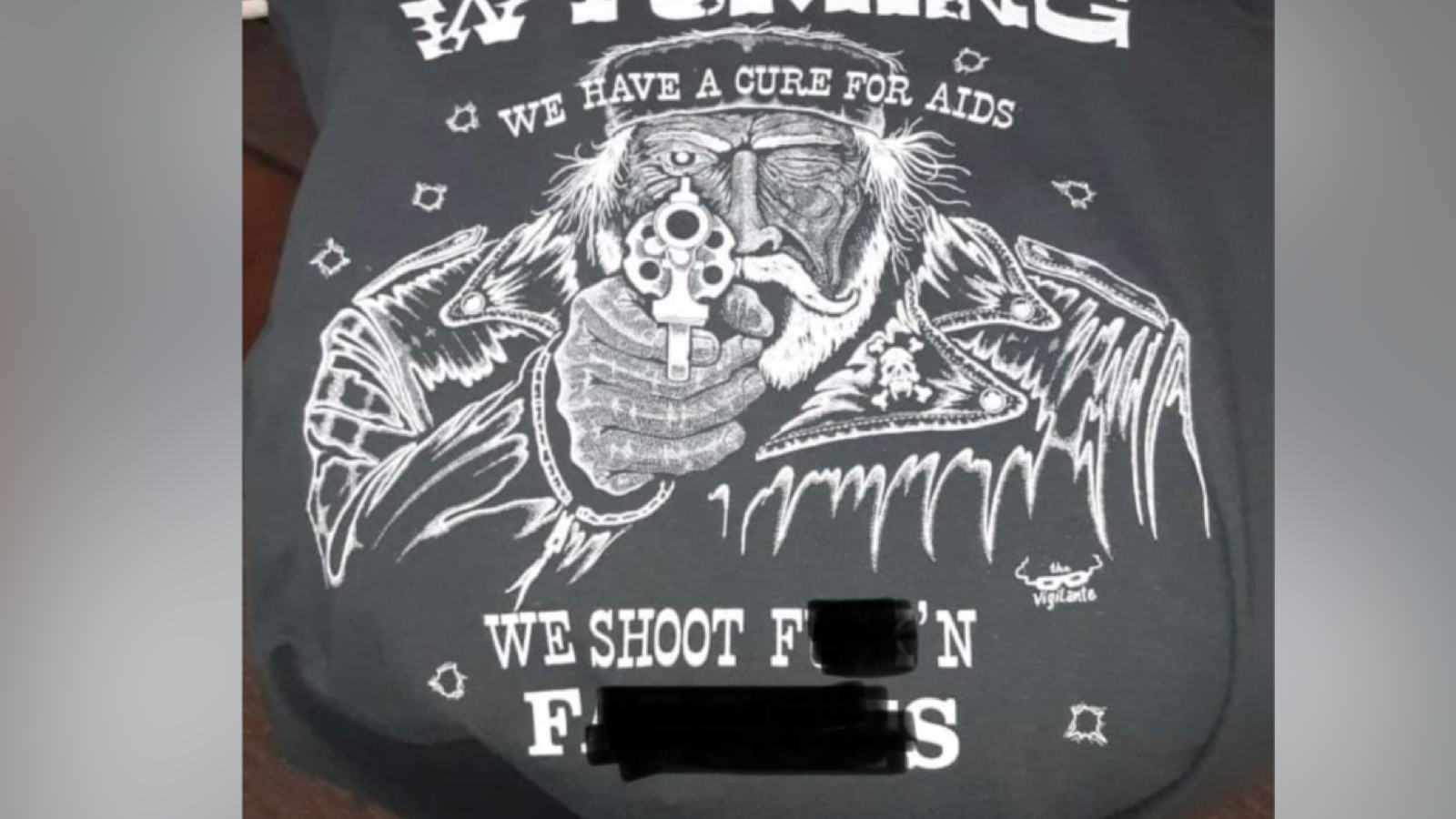 A bar has sold shirts that claims shooting gay people is "a cure for AIDS," using a homophobic slur.