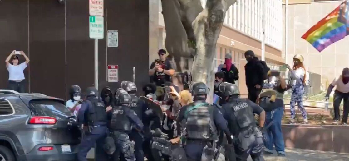 QAnon believers, trans activists, white nationalists & Antifa clash in bloody riot outside LA spa