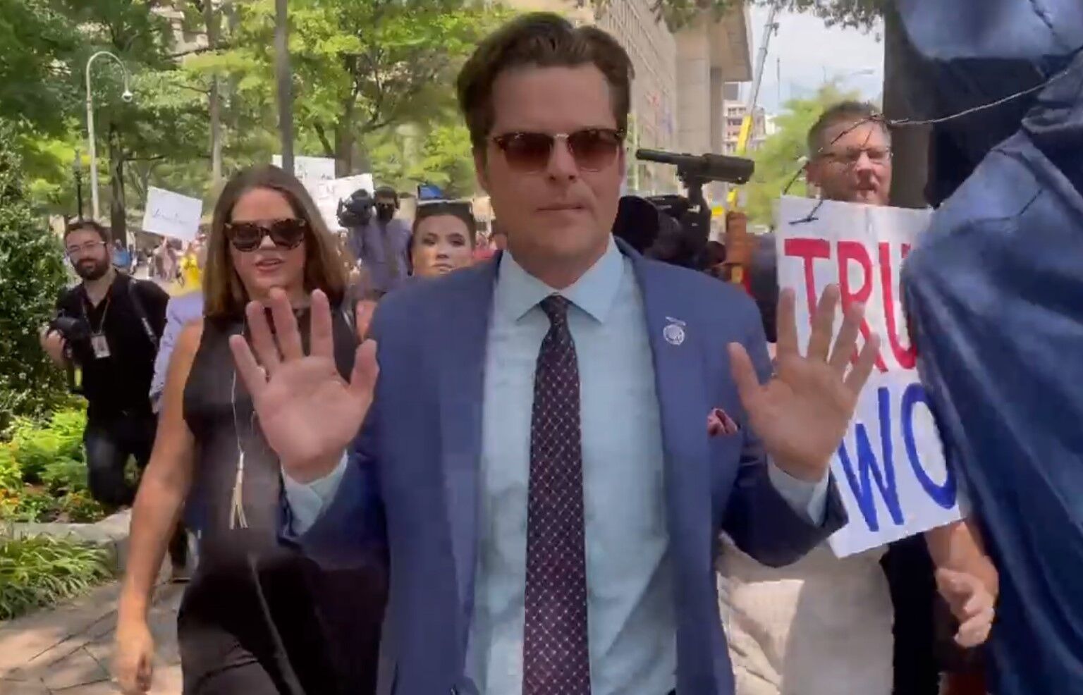 Rep. Matt Gaetz running away from the press conference as a woman asked if he's a pedophile