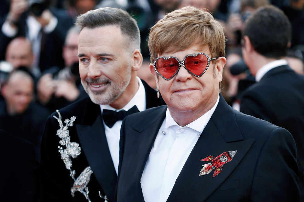 Elton John and his husband David Furnish at Cannes in 2019.