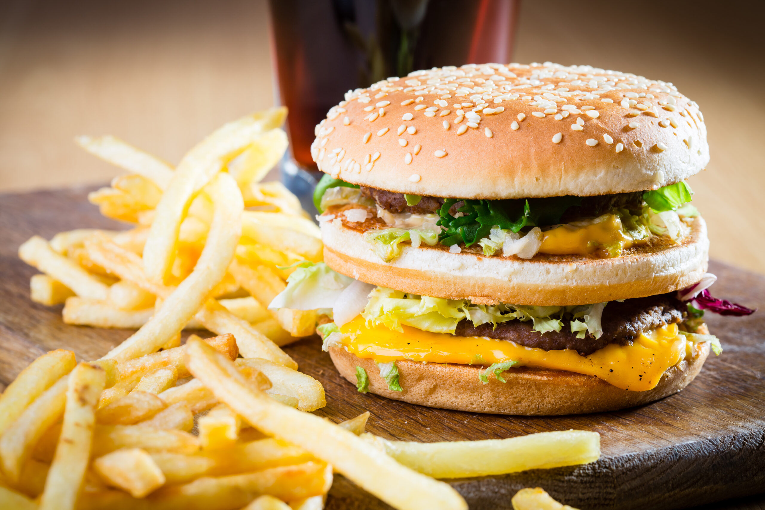 Tasty hamburger, cheeseburger, fries, soda, drink, fast food meal