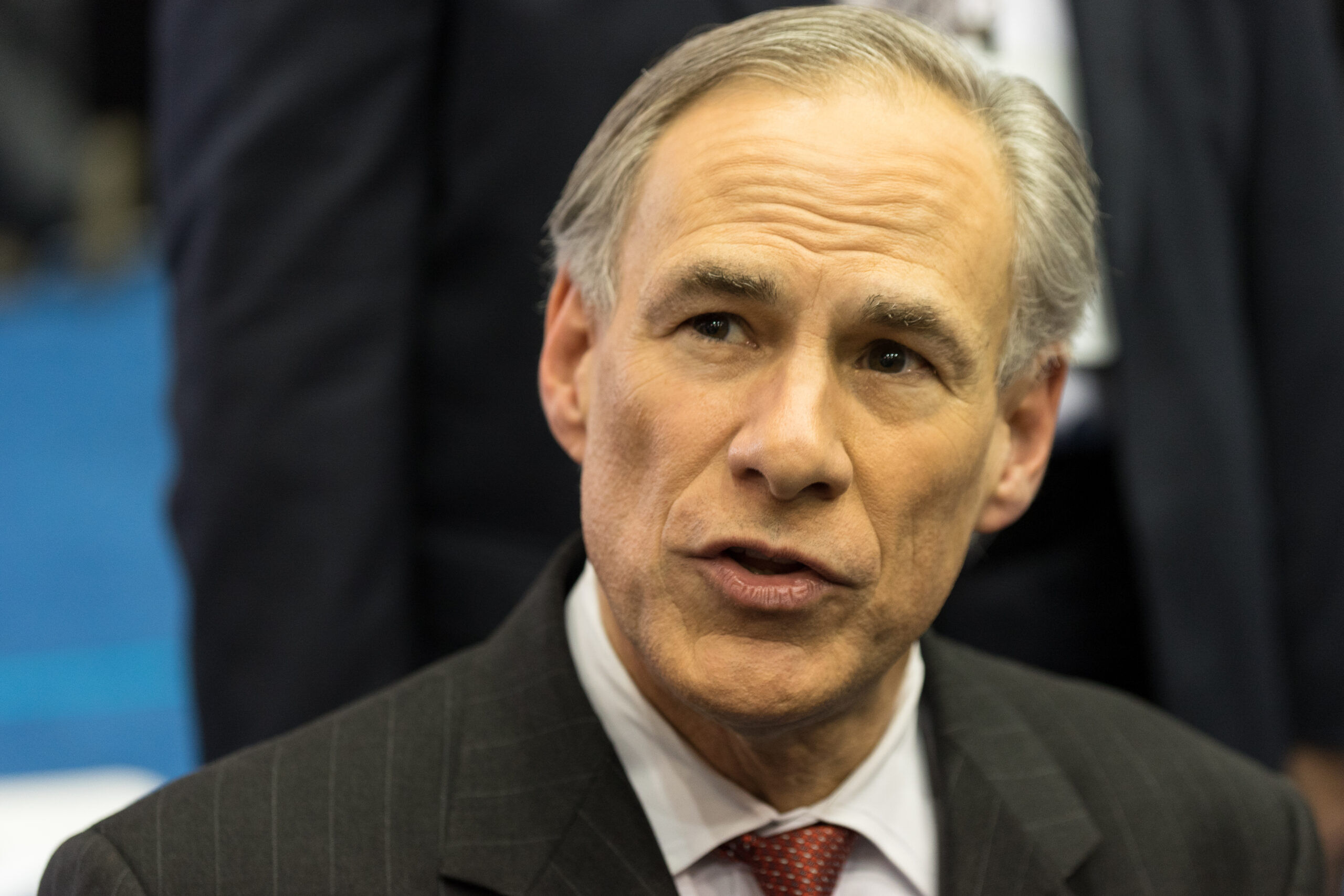 Texas Governor Greg Abbott speaks to the media before the 2016 Republican National Committee debate.