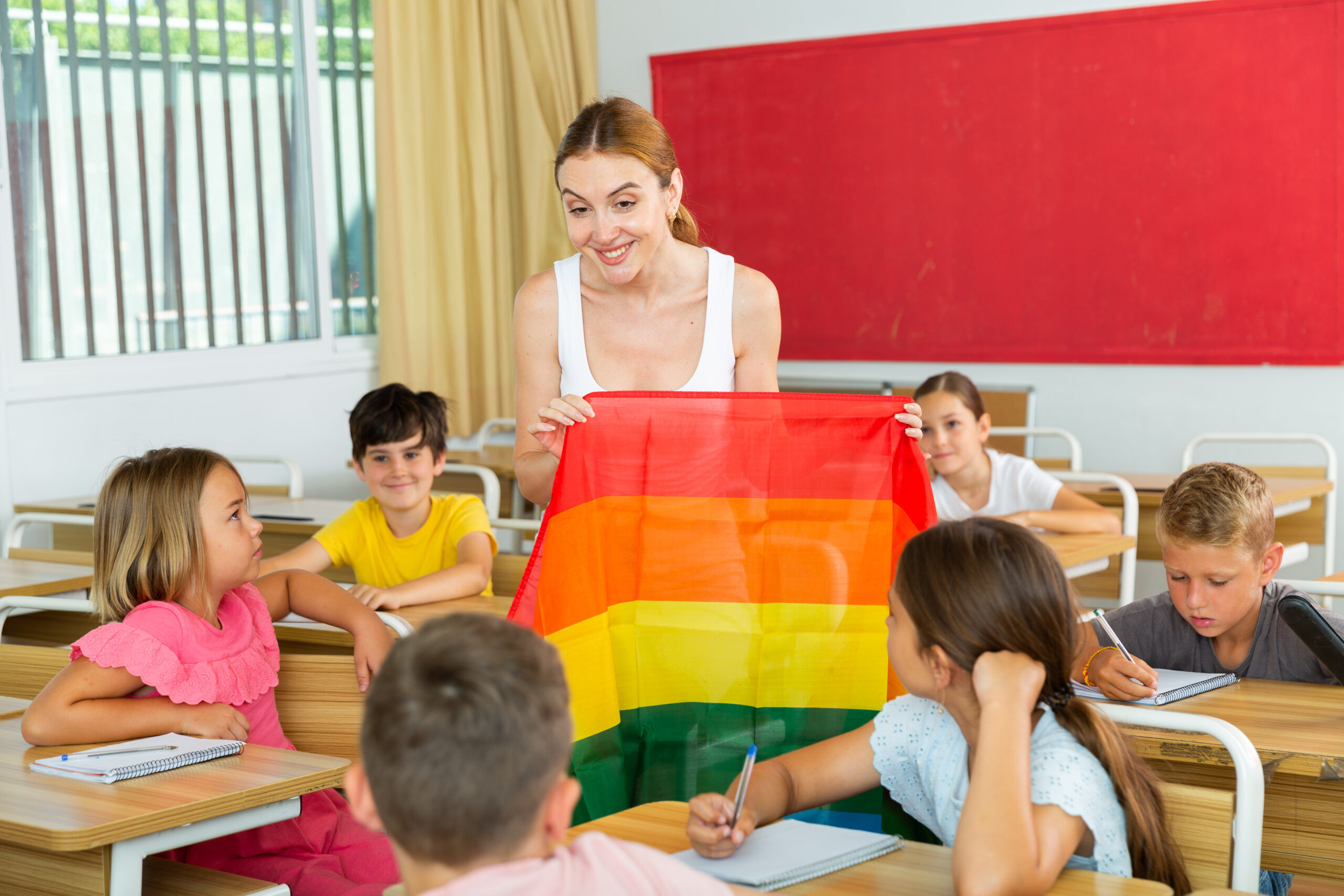 teacher pledges to gay flag