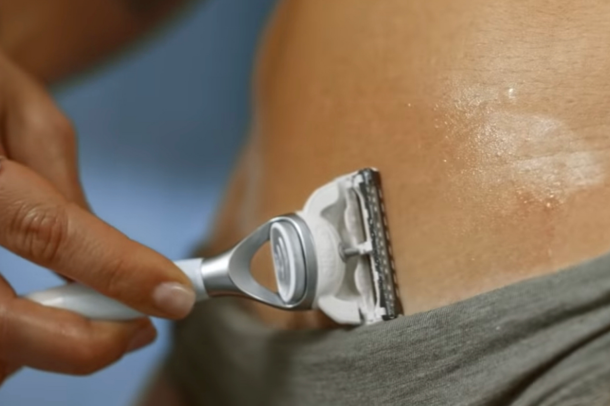 A model shaving their stomach and 'bikini line' in a Gillette Venus commercial