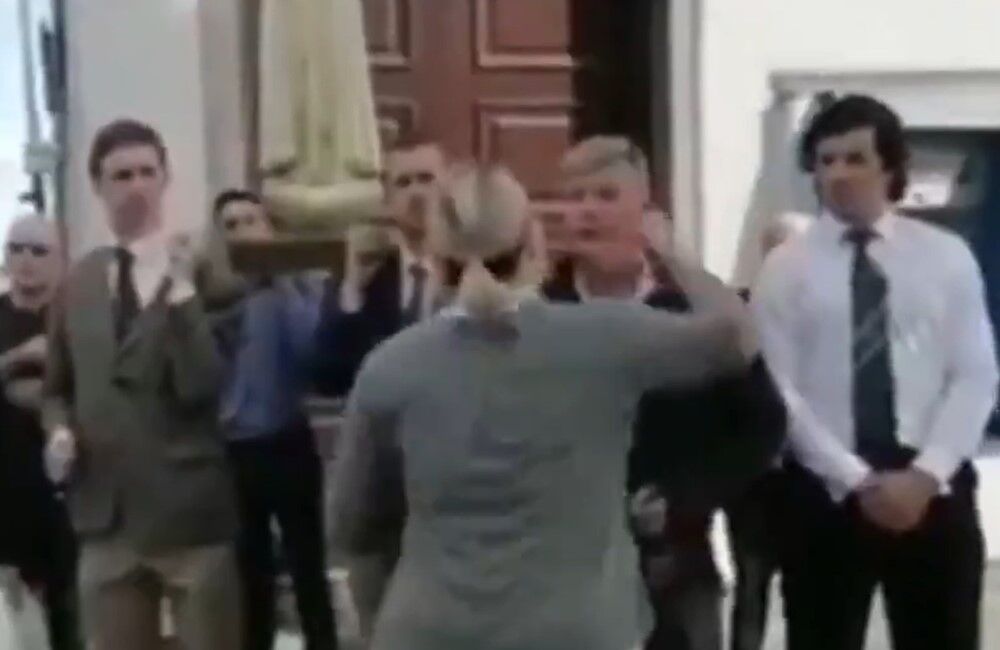 The woman punching the Pride protestor in the face