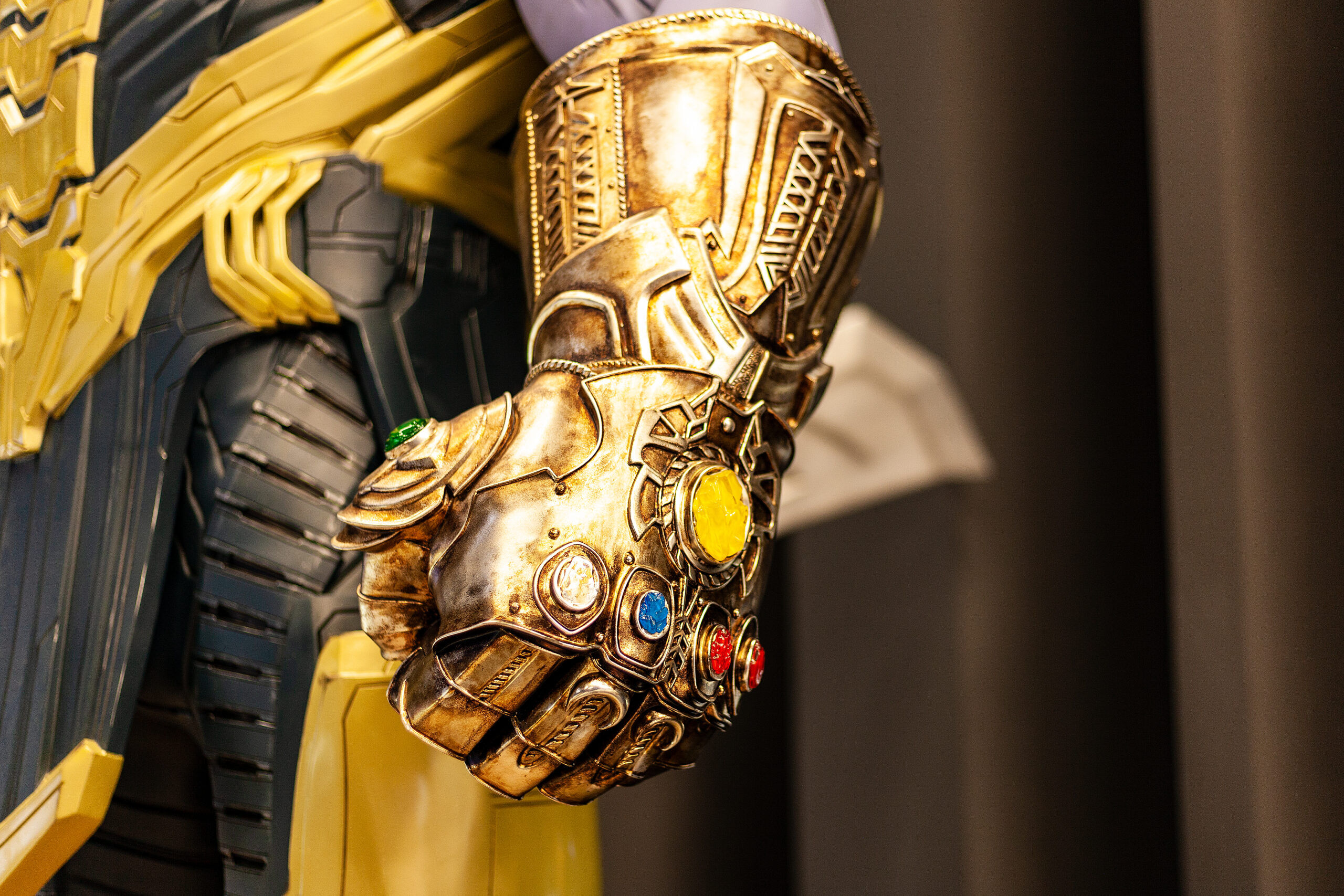 May 2019: Сlose-Up Of Thanos's Infinity Gauntlet. Huge Gold Glove With Infinity Gems. Thanos
