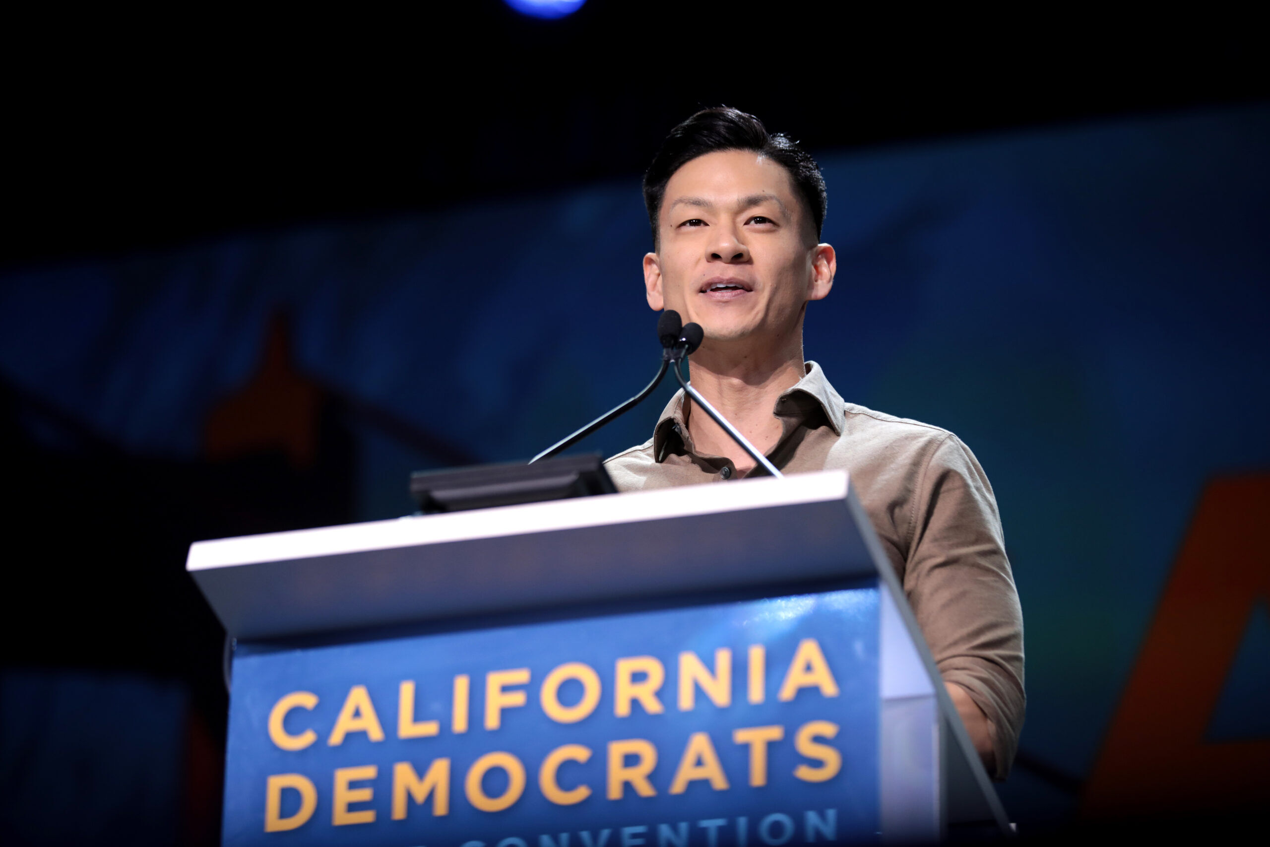 Assembly Member Evan Low speaking with attendees at the 2019 California Democratic Party State Convention at the George R. Moscone Convention Center in San Francisco, California.