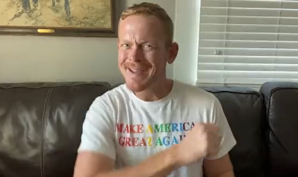 White man in a rainbow "Make America Great Again" t-shirt