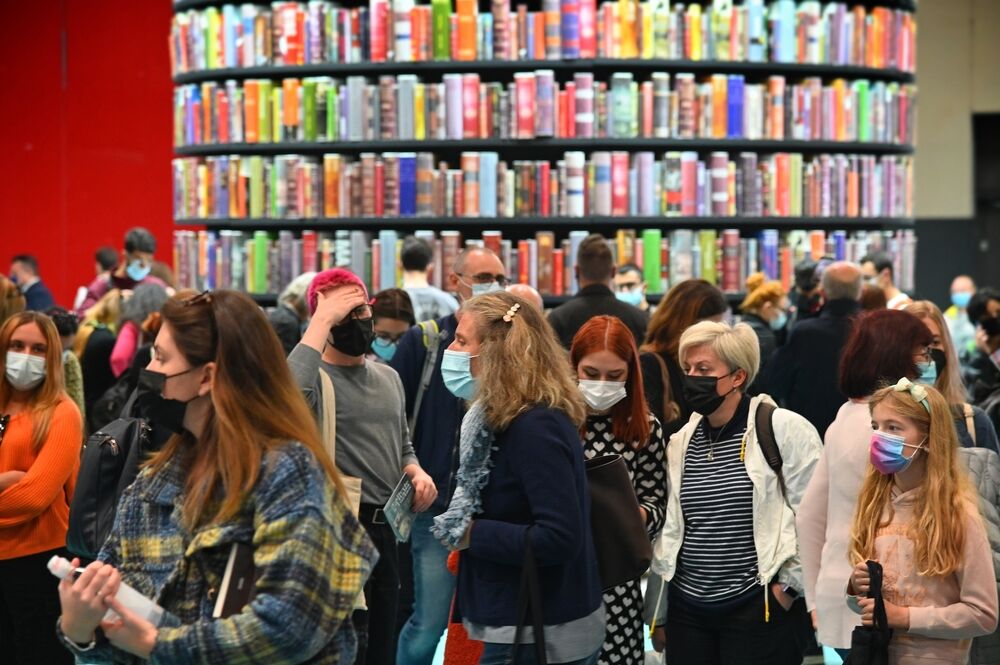 crowded international book fair with all people wearing mandatory protective mask Turin Italy October 17 2021