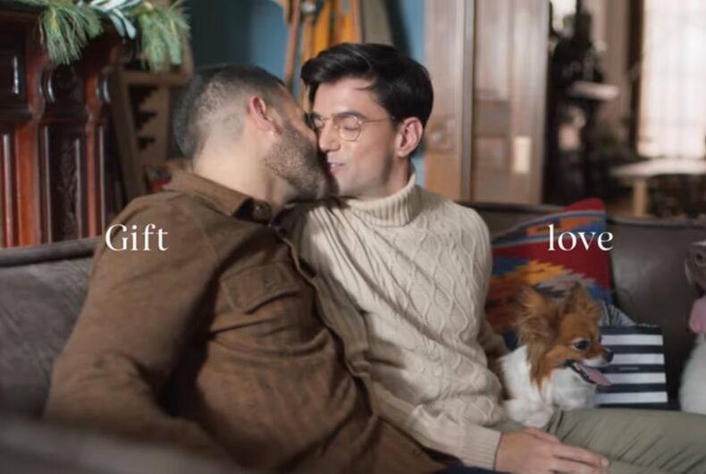 A couple sharing a kiss in a recent Sephora ad.