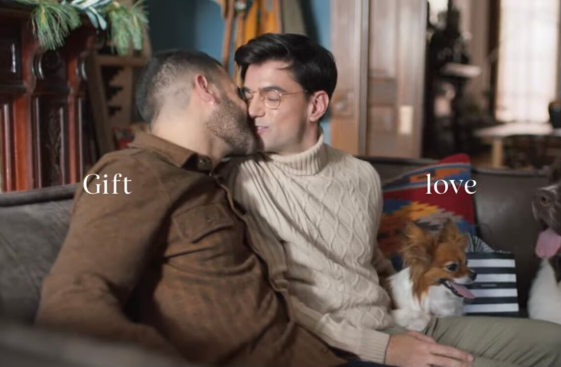 A couple sharing a kiss in a recent Sephora ad.