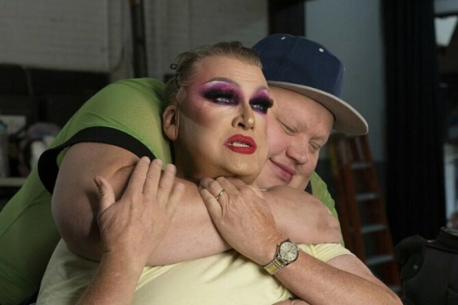 Pastor Craig Duke gets a hug from "Drag Race" alum Eureka O'Hara