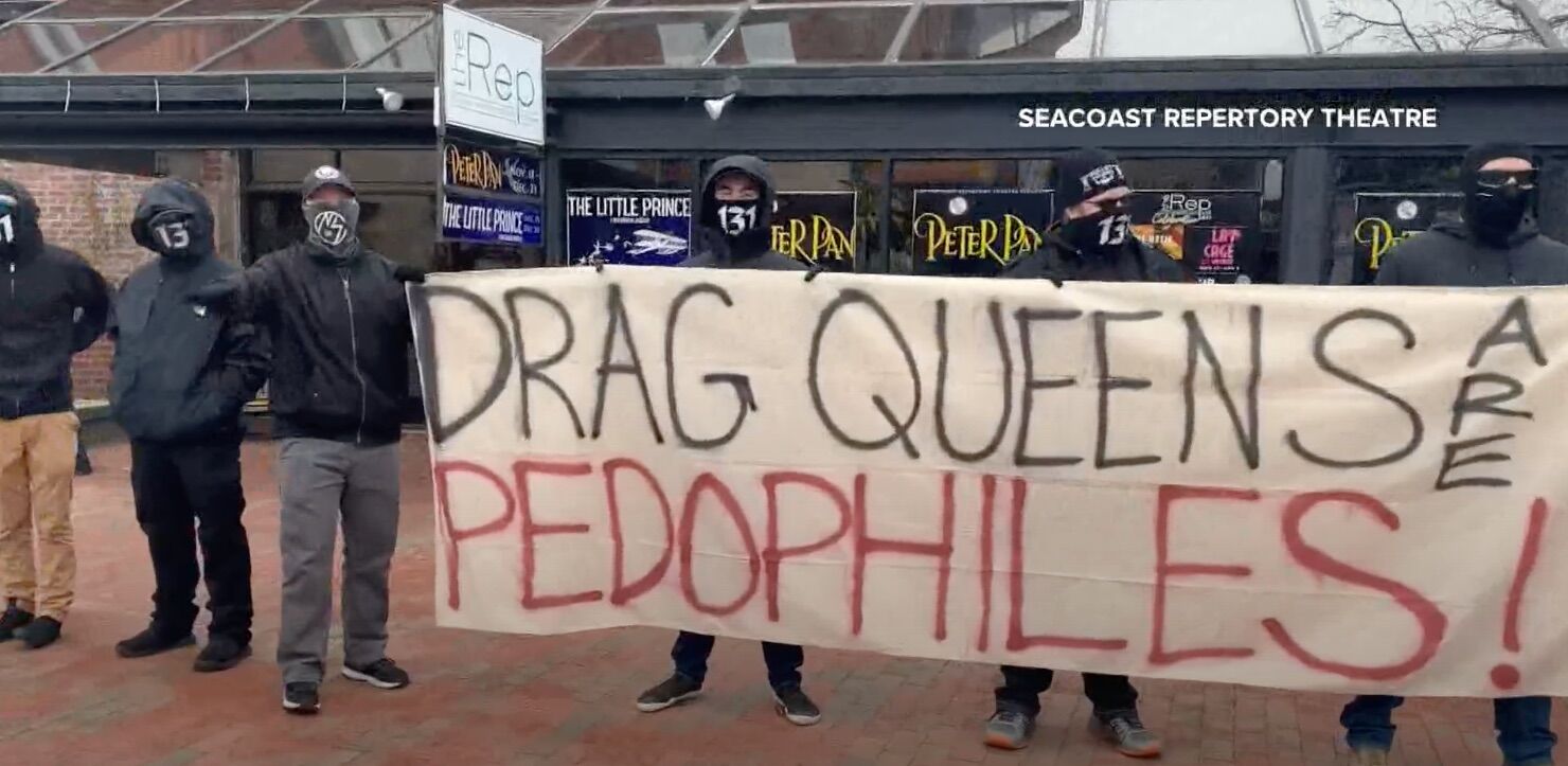 A group of men afraid to show their faces protest outside of the Seacoast Repertory Theatre over a drag queen's performance.