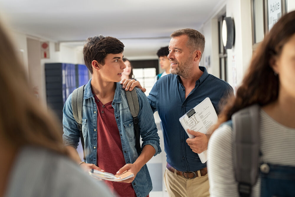 Teacher and student talking