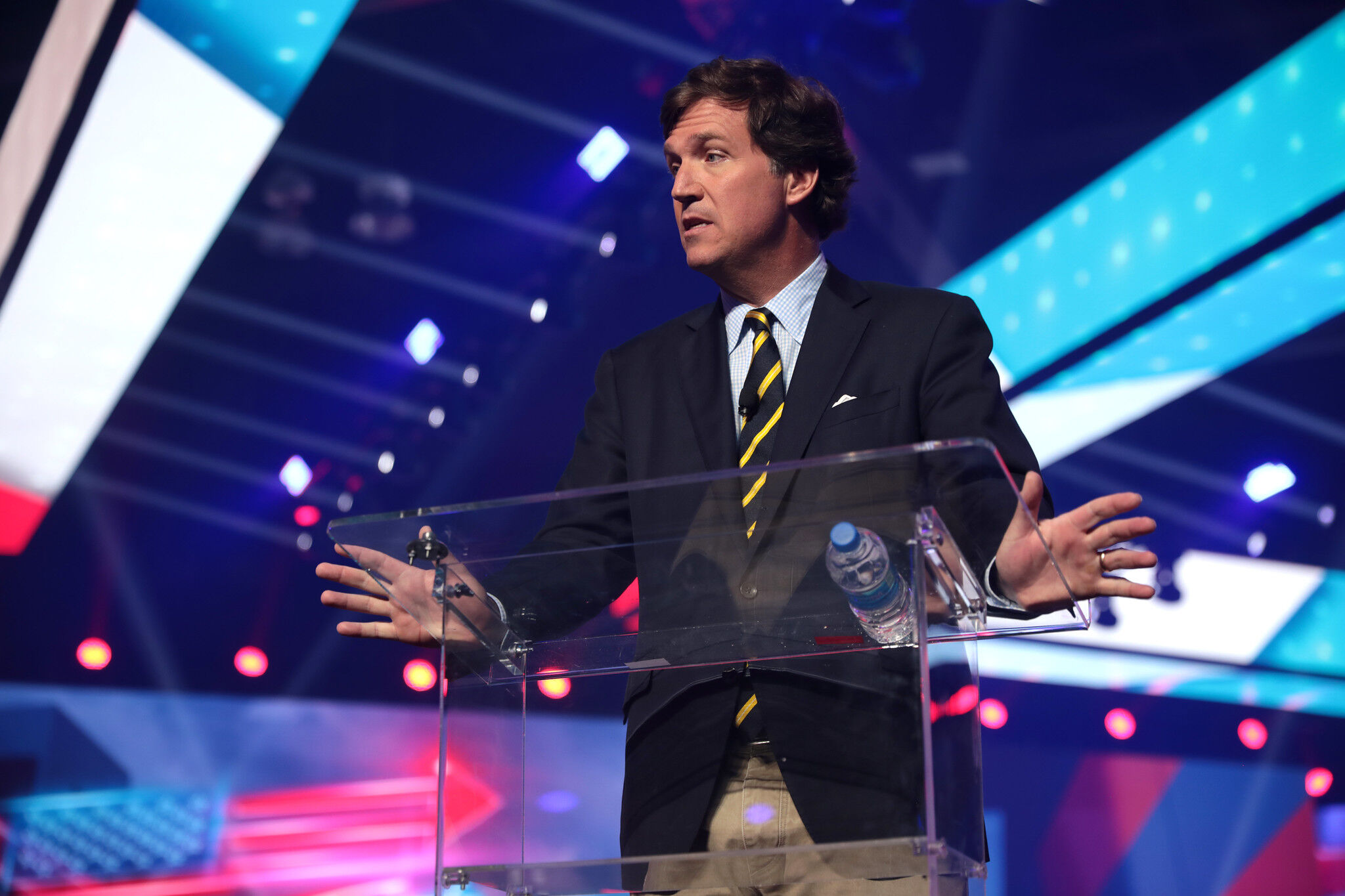 Tucker Carlson speaking with attendees at the 2021 AmericaFest at the Phoenix Convention Center in Phoenix, Arizona.