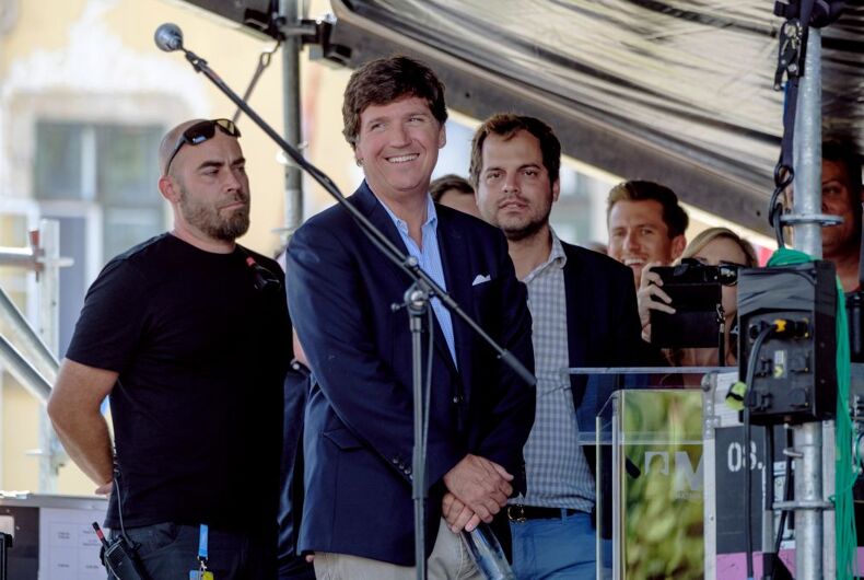 ESZTERGOM, HUNGARY - AUGUST 07: Tucker Carlson on stage before his speech during the Mathias Corvinus Collegium (MCC) Feszt on August 7, 2021 in Esztergom, Hungary. on August 7, 2021 in Esztergom, Hungary. The multiday political event was organized by the Mathias Corvinus Collegium (MCC), a privately managed foundation that recently received more than $1.7 billion in government money and assets. The leader of its main board, Balazs Orban, who is also a state secretary in the prime minister's office, said MCC's priority is promoting "patriotism" among the next generation of Hungary's leaders. (Photo by Janos Kummer/Getty Images)