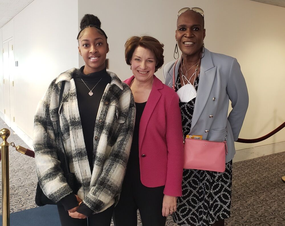 Andrea Jenkins with her daughter and Sen. Amy Klobuchar