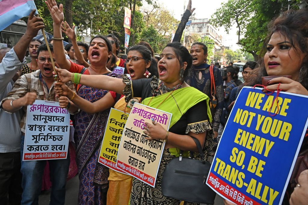 Activists and supporters of LGBTQ community take part in a rally to mark the International Transgender Day of Visibility in Kolkata on March 31, 2022. (Photo by Dibyangshu SARKAR / AFP) (Photo by DIBYANGSHU SARKAR/AFP via Getty Images)