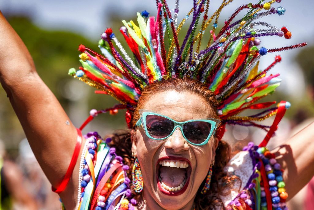 A participant poses for a photo during the annual Pride Parade in Israel's Mediterranean coastal city of Tel Aviv on June 10, 2022.