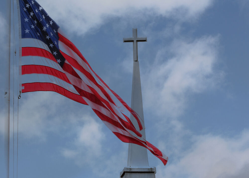 American flag and a cross