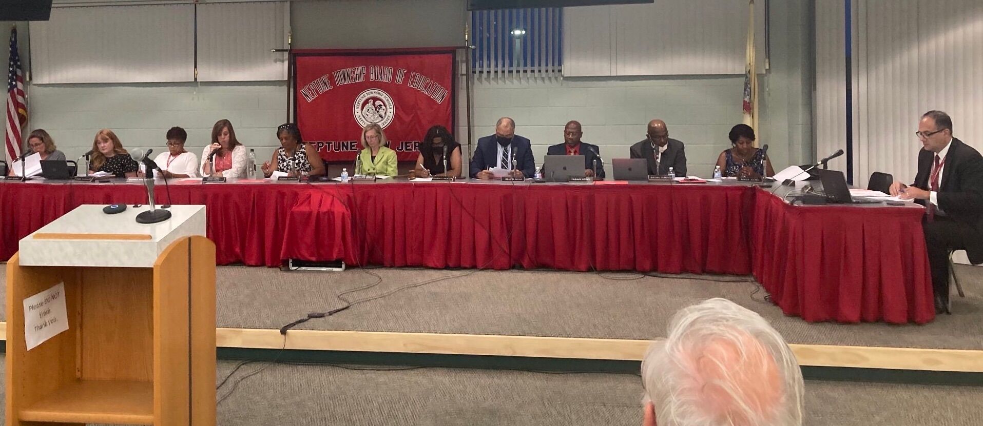 The Neptune Township Board of Education held a meeting to discuss Michael Smurro's reinstatement